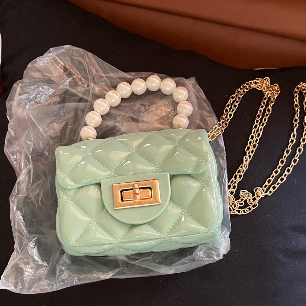Mint Green Quilted Handbag with Pearl Handle. Gold chain for Crossbody.